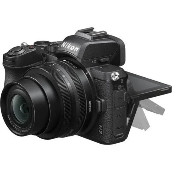 Cámara Nikon Z50 con lente NIKKOR Z DX 16-50mm VR para fotografía y video de alta calidad. Nikon Z50 mirrorless con sensor APS-C DX y enfoque automático rápido y preciso. Cámara Nikon Z50 con lente 16-50mm estabilizado ideal para viajes, retratos y creación de contenido. Nikon Z50 compacta y ligera con grabación de video 4K y excelente calidad de imagen. Cámara Nikon Z50 con lente zoom NIKKOR Z 16-50mm perfecta para fotografía diaria y uso profesional.